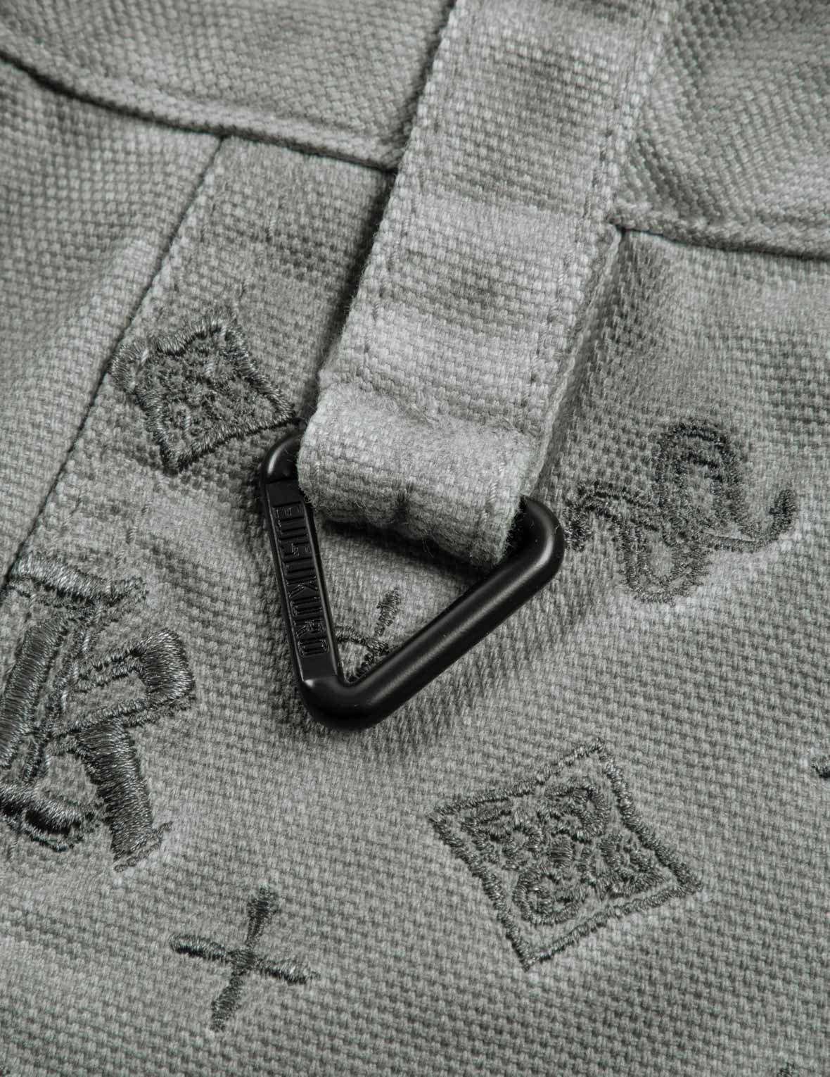 满地图案刺绣口袋水洗束脚裤