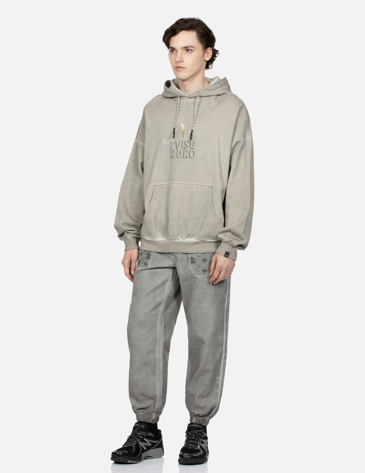 满地图案刺绣口袋水洗束脚裤