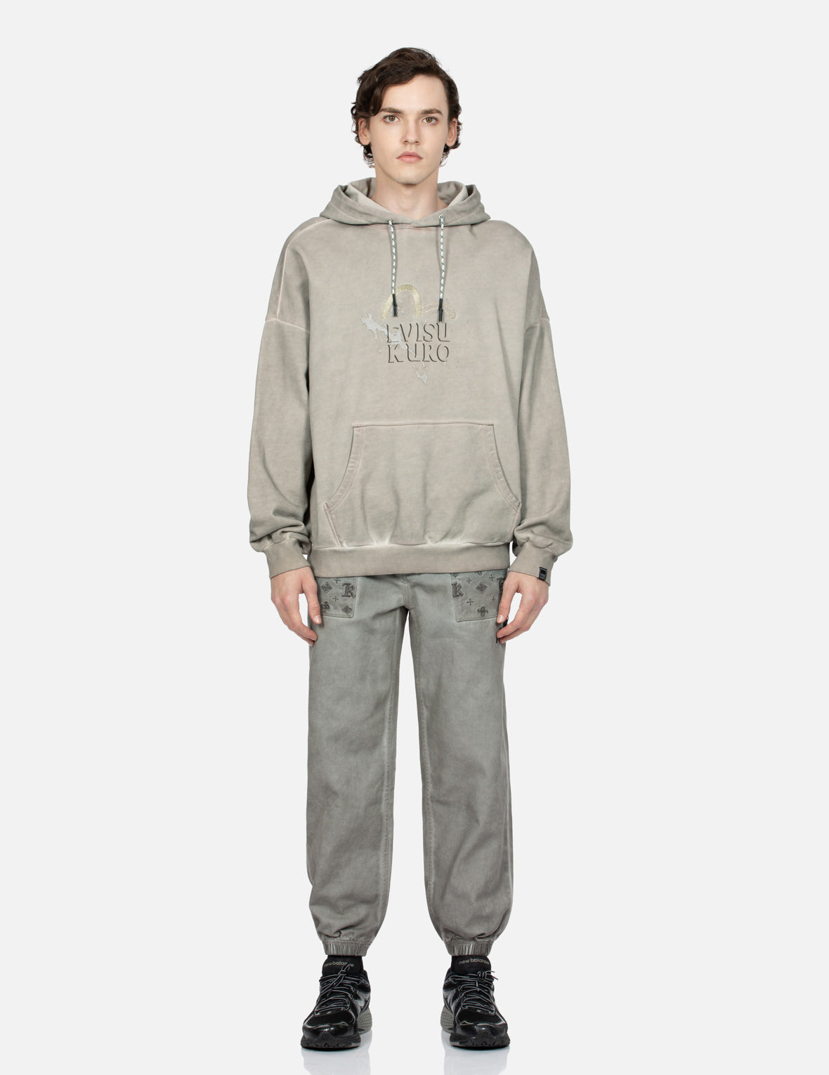 满地图案刺绣口袋水洗束脚裤