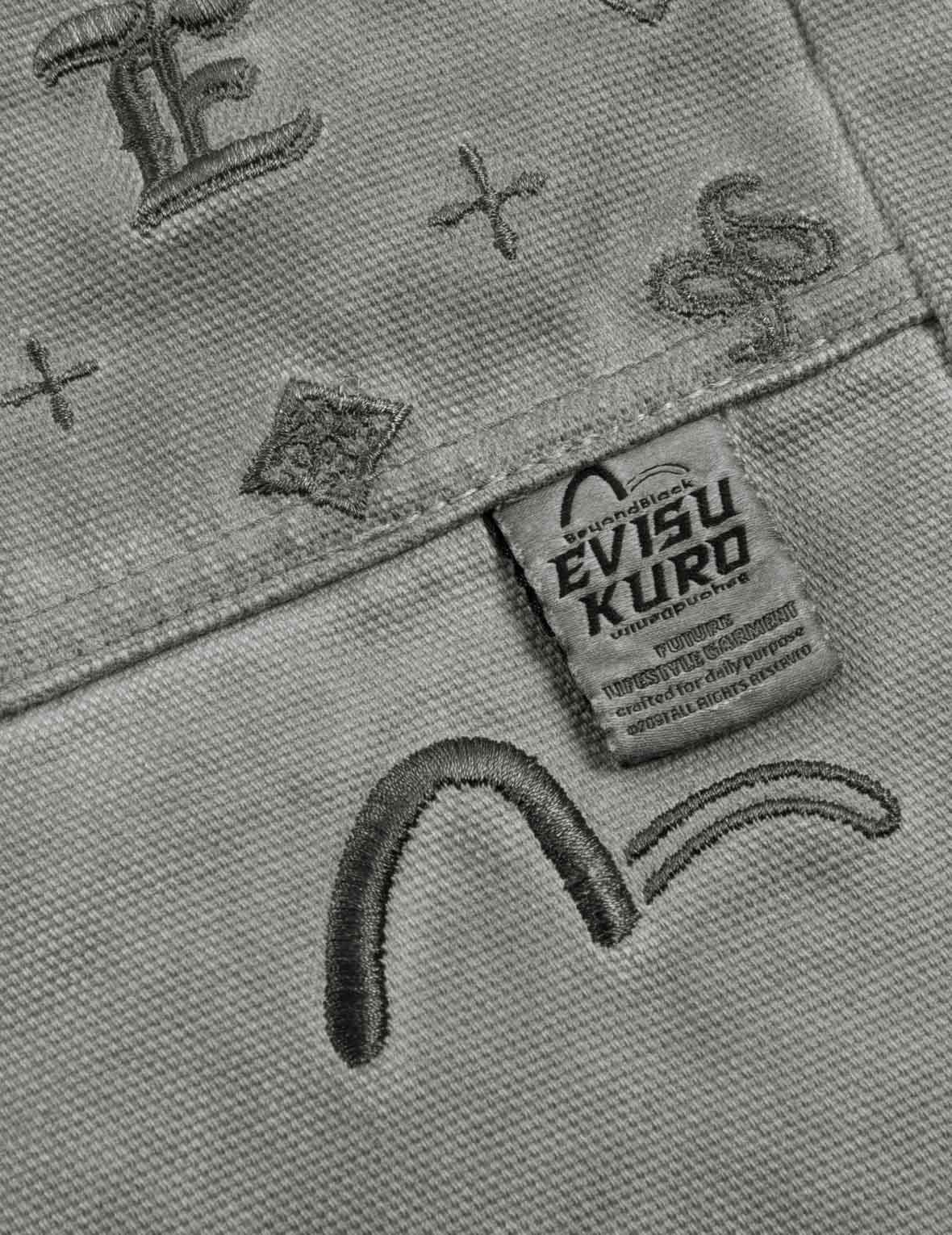 满地图案刺绣口袋水洗束脚裤