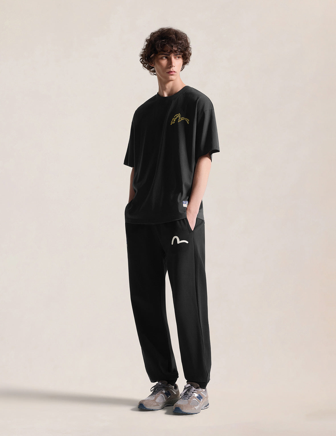 大M印花口袋图案运动裤